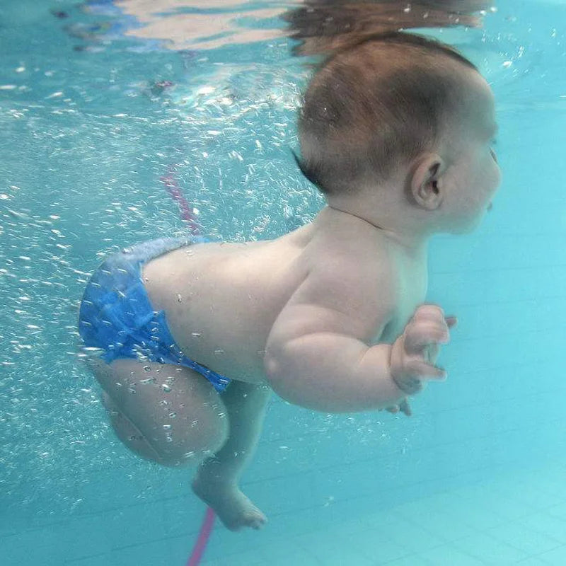 Baby swim diaper, Reusable swim diaper, Waterproof swim nappy, Infant swim diaper, Toddler swim nappy, Adjustable swim diaper, Leak-proof swim diaper, Eco-friendly swim nappy, Baby pool diaper, Swimming diaper cover, Baby swimwear diaper, Reusable baby nappy, Toddler pool pants, Infant swimming trunks, Baby beach diaper